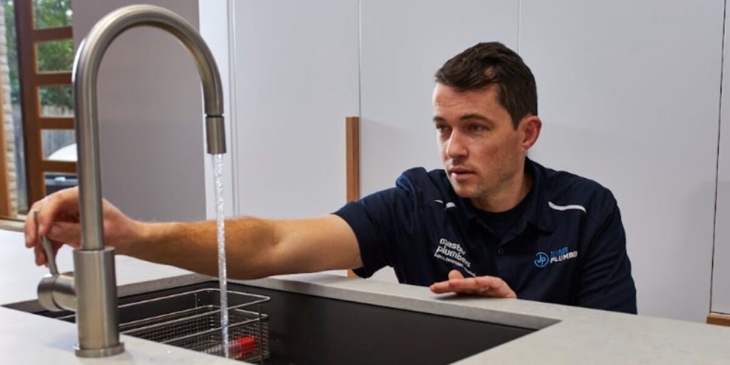 Melbourne Plumber Testing A Tap Water Flow