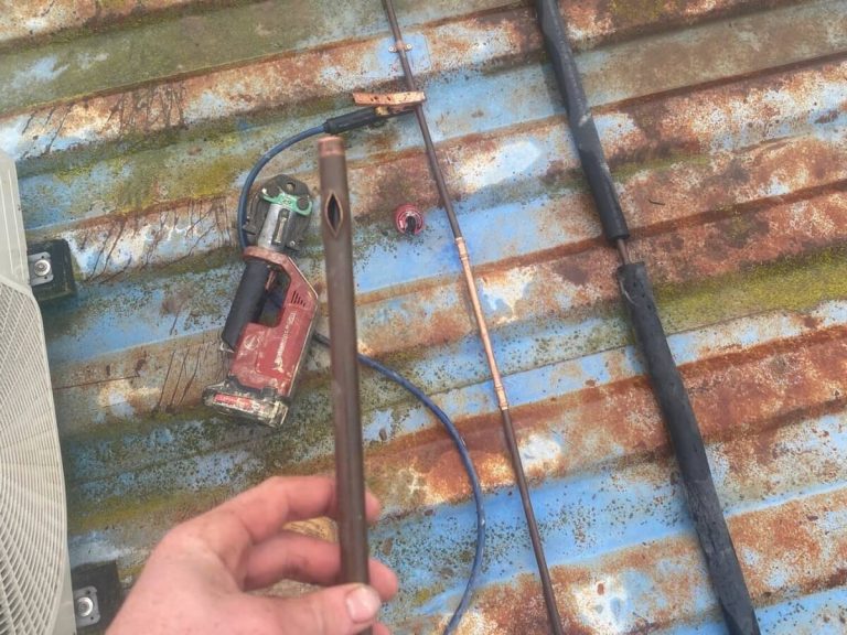 Melbourne Plumber Holding A Burst Pipe