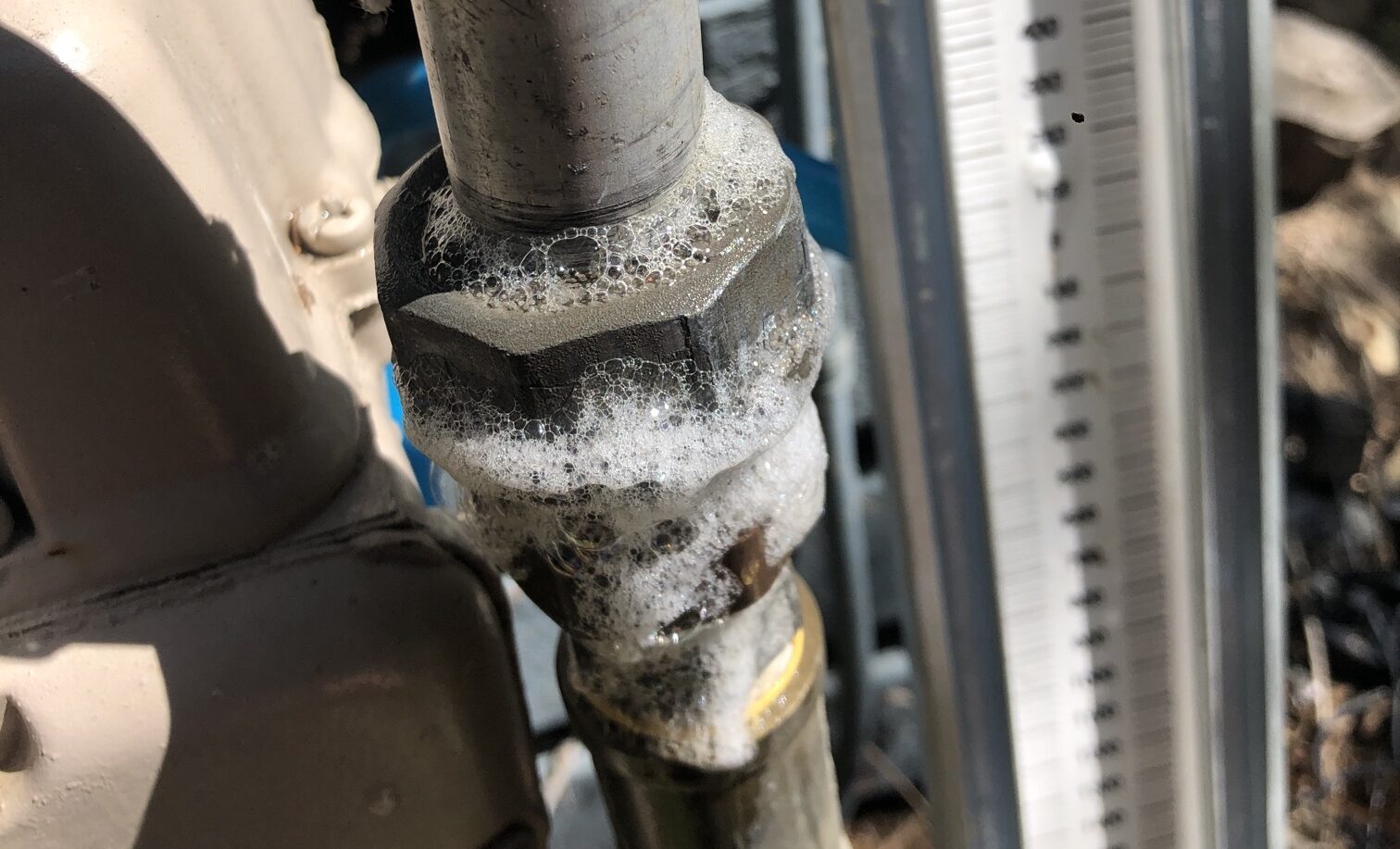 Licensed gas plumber inspecting a gas appliance in Melbourne
